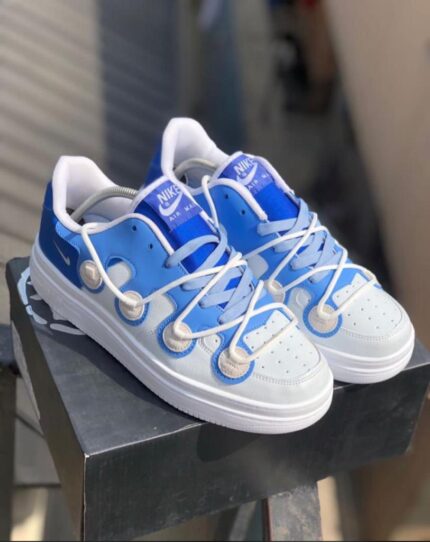 White Sneakers with Blue Design
